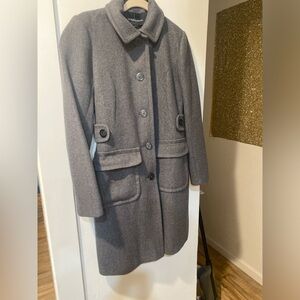 Gray wool coat with buttons and pockets.  Belt included.